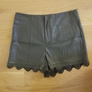 Green faux leather shorts
